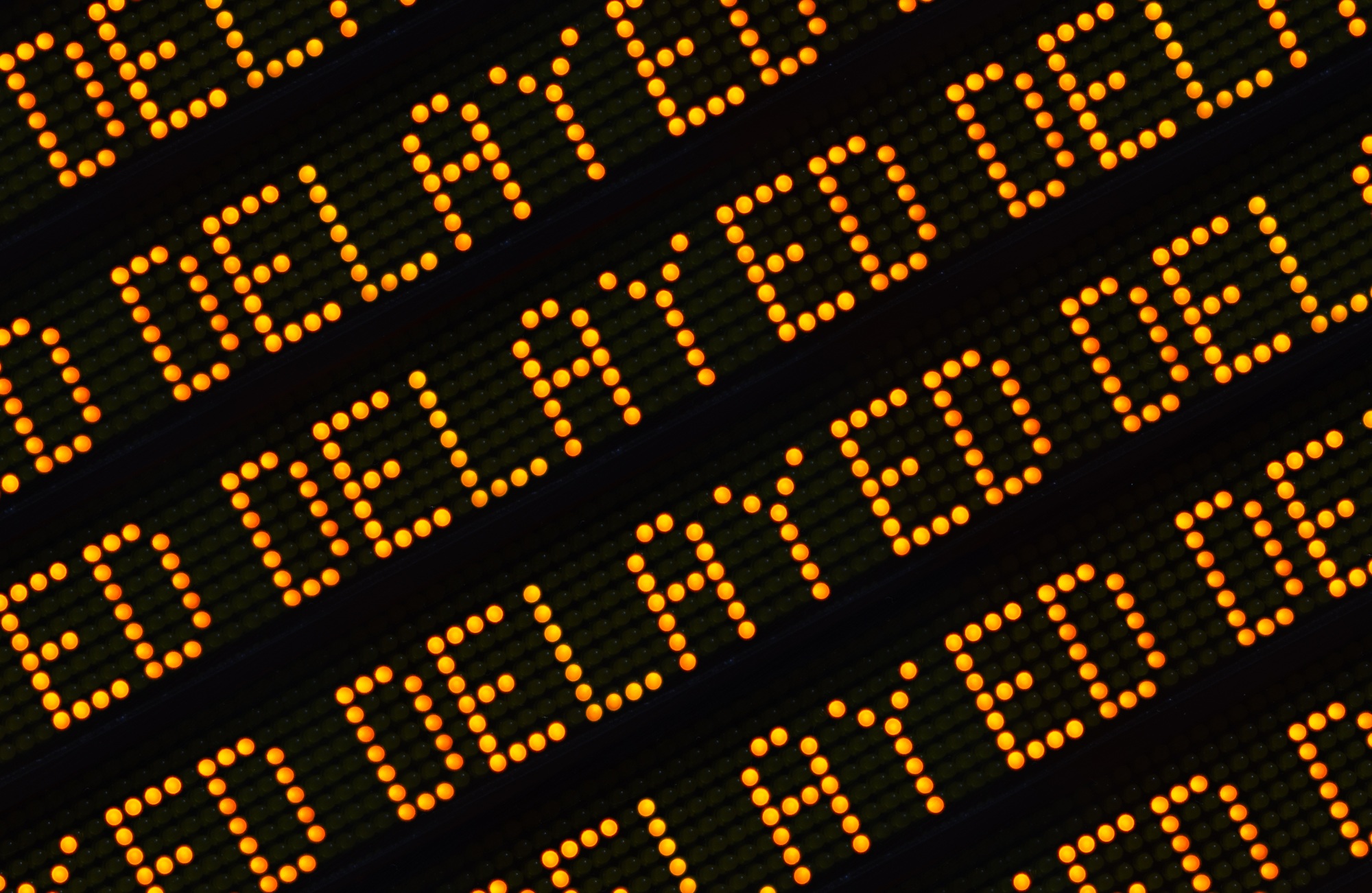 Digital LED display showing repeated ‘Delayed’ messages, symbolizing costly downtime on construction or utility job sites.